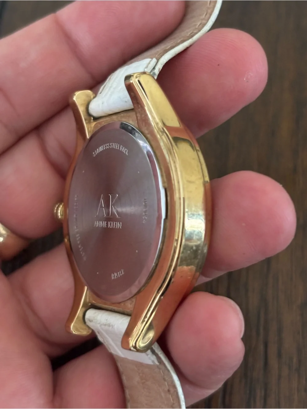 Anne Klein Gold and White Leather Strap Crystal Accent Watch